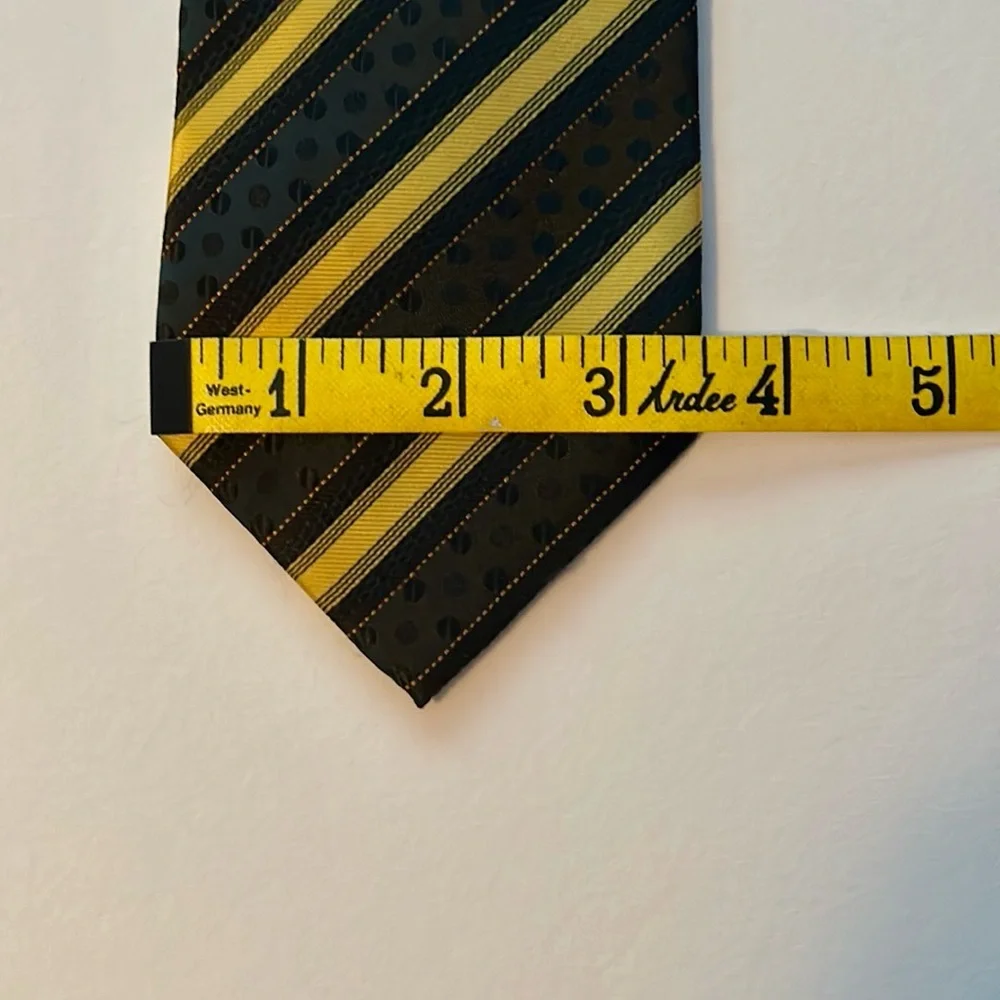 Striped black and gold men's dressy tie
